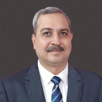 Dr. Arun Sacher